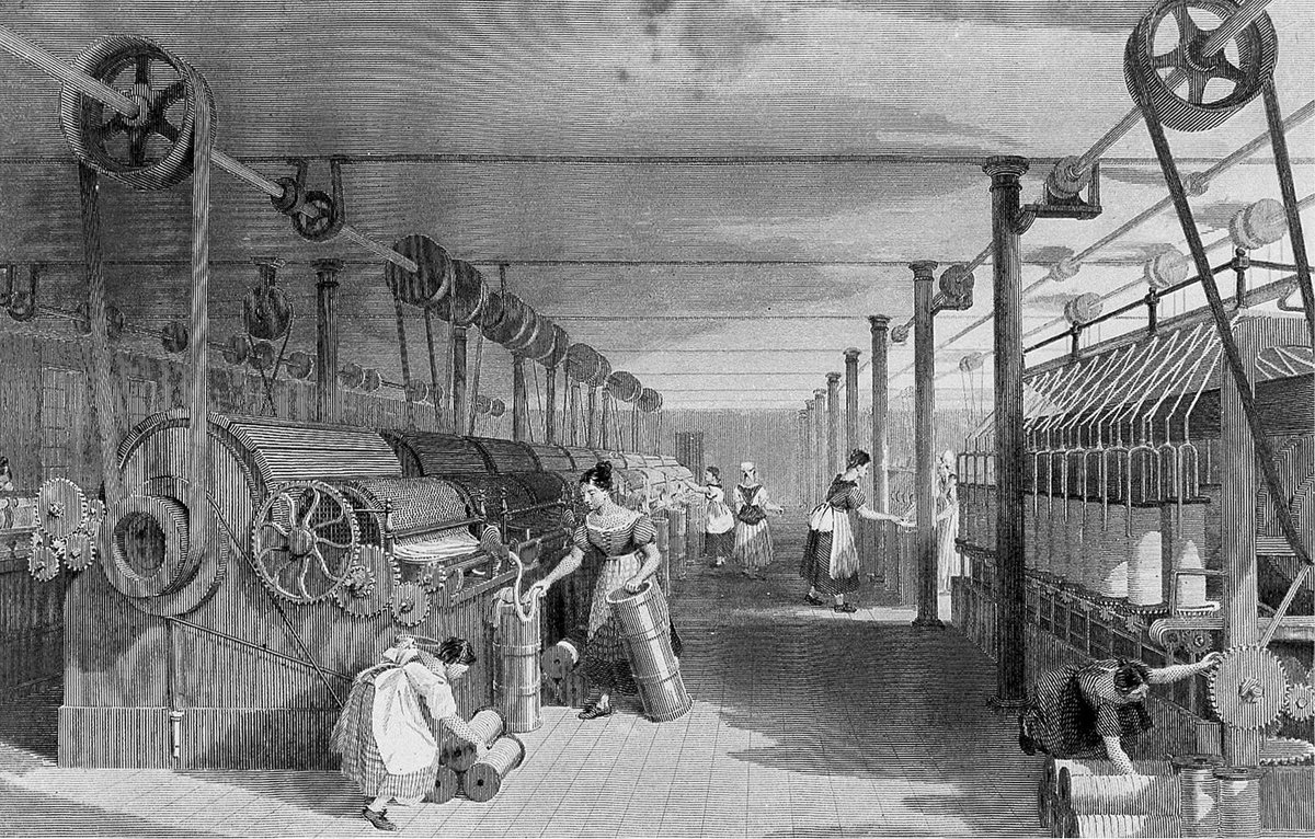 托马斯·阿洛姆 1835 年的版画，描绘了英国兰开夏郡的一家纺织厂。它由蒸汽机驱动。